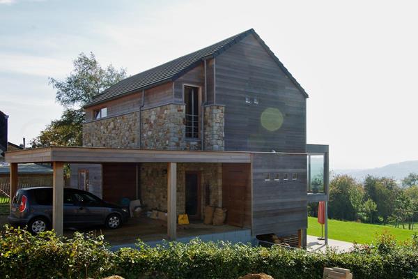 ©Roofland - Dreistöckiges Holzrahmenhaus in Rouvreux (B)